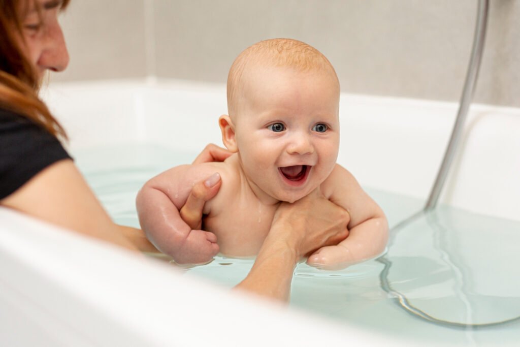 Baby bath as an activity for your six month old. 