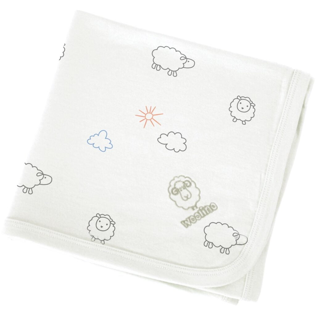 An organic wool baby swaddle that assures comfort & sleep